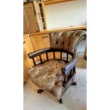 Leather office chair. olive green/brown, buttoned leather, rotating. Condition. Overall good