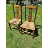 Pair Of Arts And Crafts Antique Chairs. Rush seats. Condition. One seat needs attention. See images.