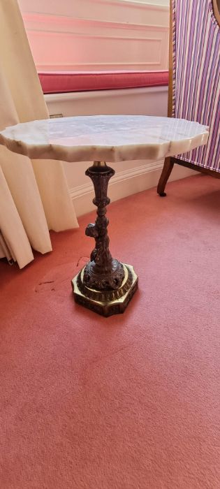 Small wine table with a marble top, a cast leg depicting a classical cherub on a brass base. Maybe a - Image 5 of 7