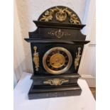 Large slate mantle clock with inlaid decoration and brass gilt adornments. Victorian.
