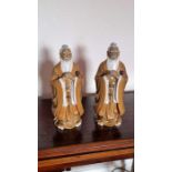 2 large figures of Chinese Mudmen in brown robes. H31cm Condition no signs of damage or repair.