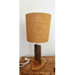Mid 20thC table lamp styled around a heavy slate base with large shade.