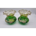 Pair of hand painted green glass vases floral design. Condition. No signs of damage or repair