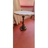 Small wine table with a marble top, a cast leg depicting a classical cherub on a brass base. Maybe a