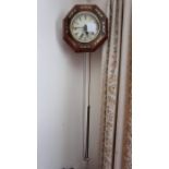 Alarm chime clock with inlaid design.