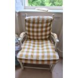 Wooden arm chair over-painted white upholstered with pale yellow check fabric. Good condition.