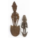 TWO PAPUA NEW GUINEA CARVED WOOD FIGURAL HOOKS