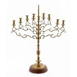 E. 20TH C. CONTINENTAL BRASS MENORAH ON STAND