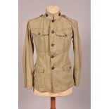 US. Veste M-1912 summer en toile beige à 4 poches et boutons amovibles en métal bronzé. Insigne de