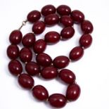 Large Cherry Amber and Gold Bead Necklace