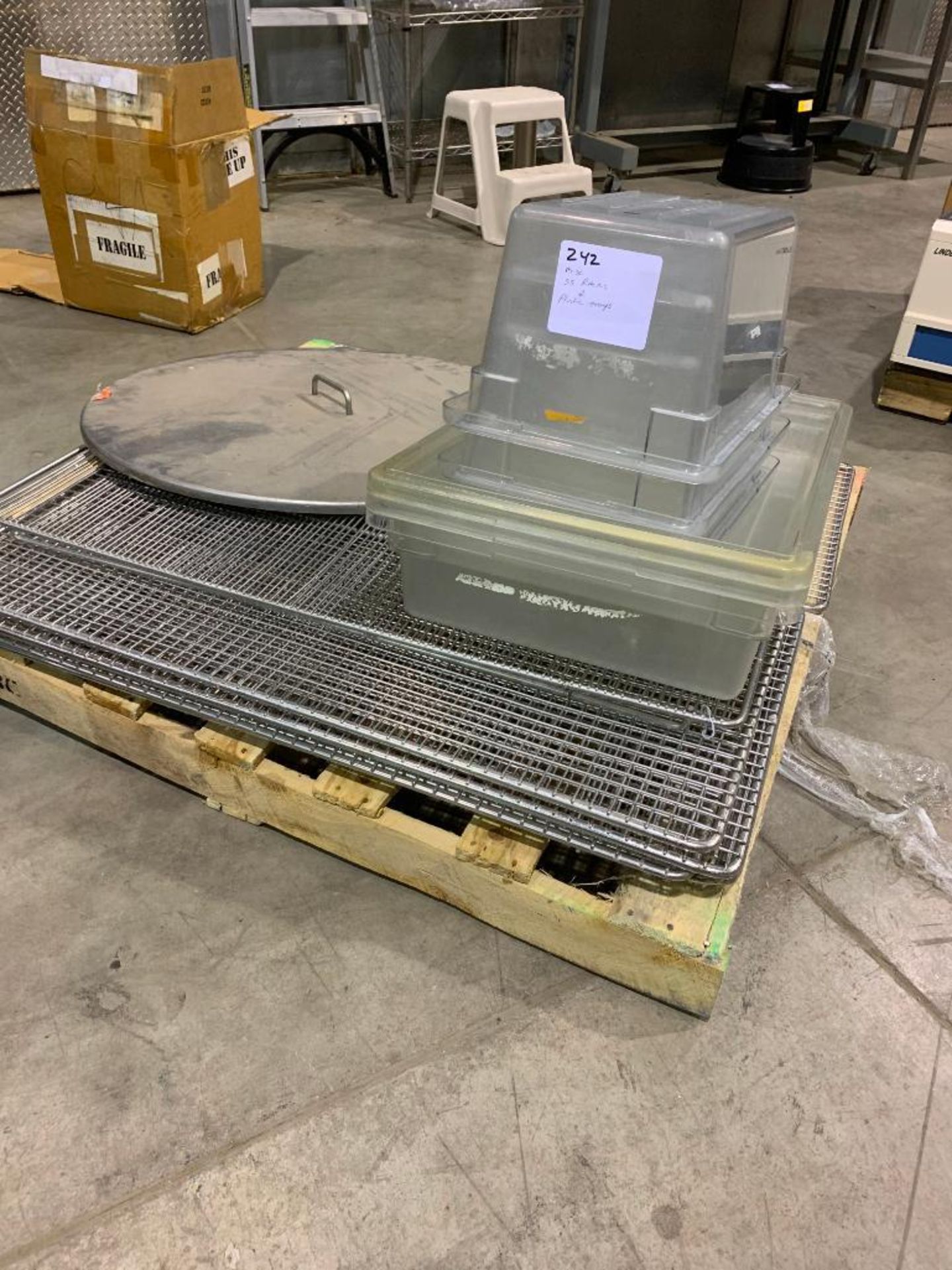 misc. stainless steel racks and plastic trays