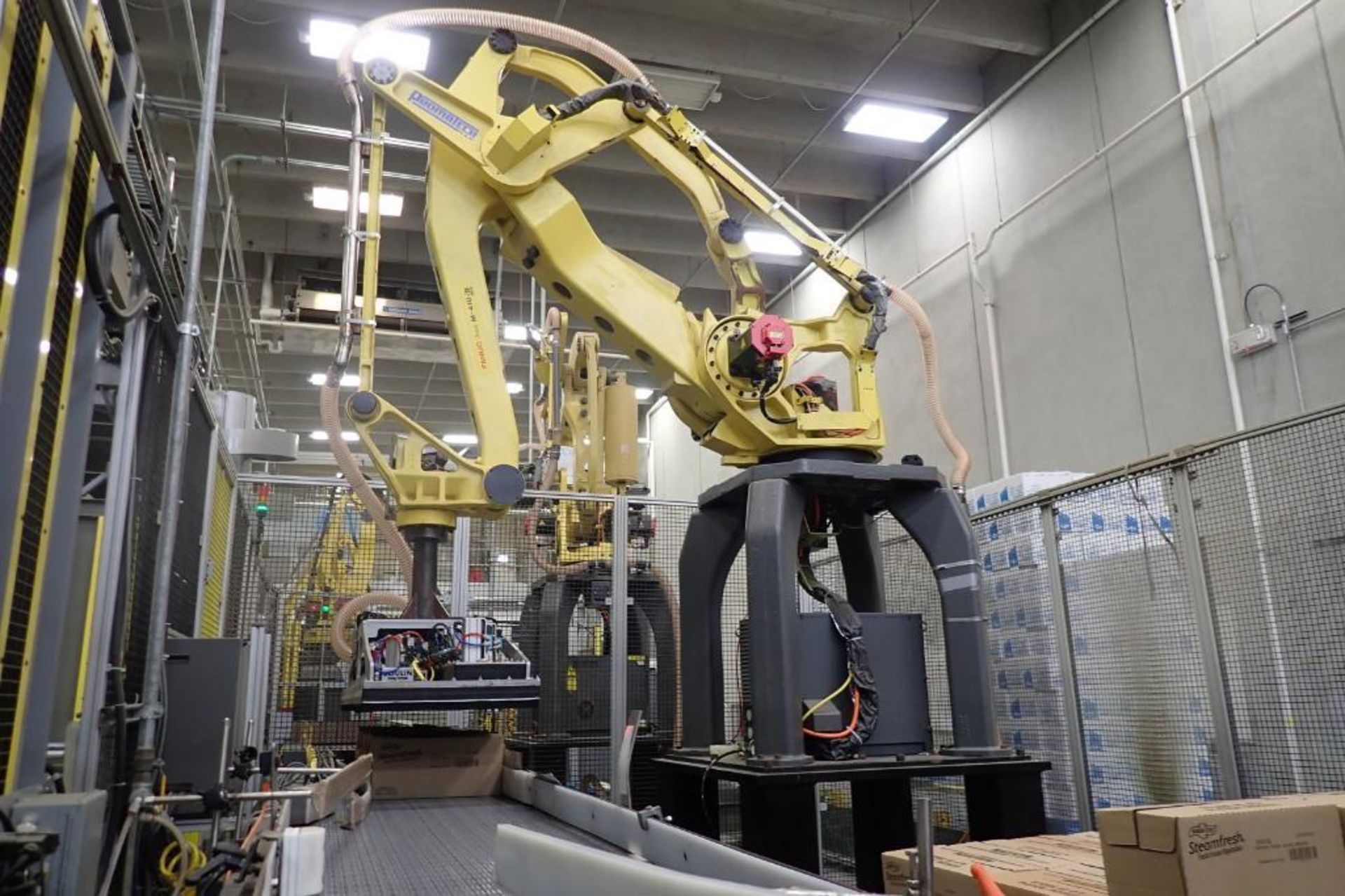 Fanuc palletizing robot model M-410-iB16 with controller and pendant