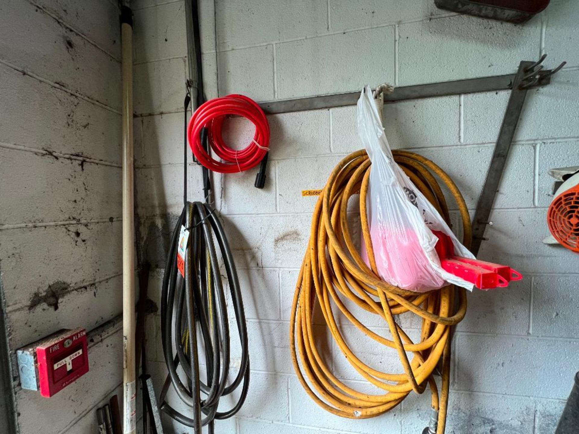 hoses on wall, includes nozzle