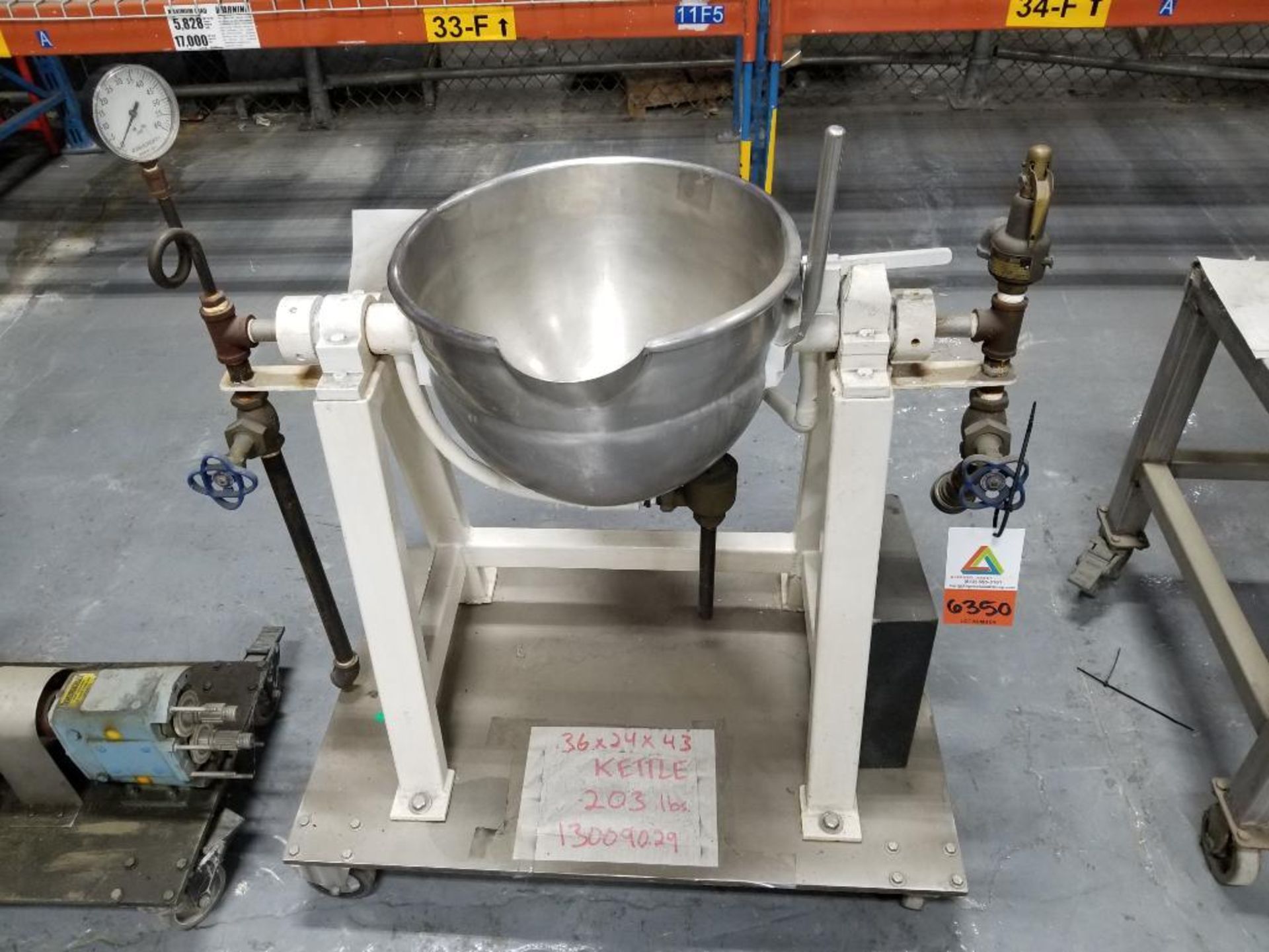 stainless steel tilting jacketed steam kettle on rolling stand