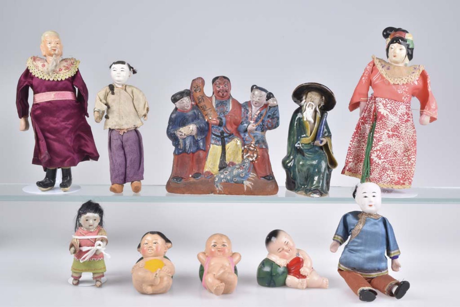 Los 10 japanische Puppen und Figuren Unterschiedliche Darstellungen, verschiedene Mate