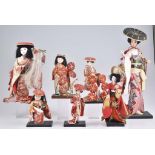 Schönes Los 7 Muschelkalkpuppen Japan, 20 Jh., japanische Kabuki / Geisha Puppen, Mu