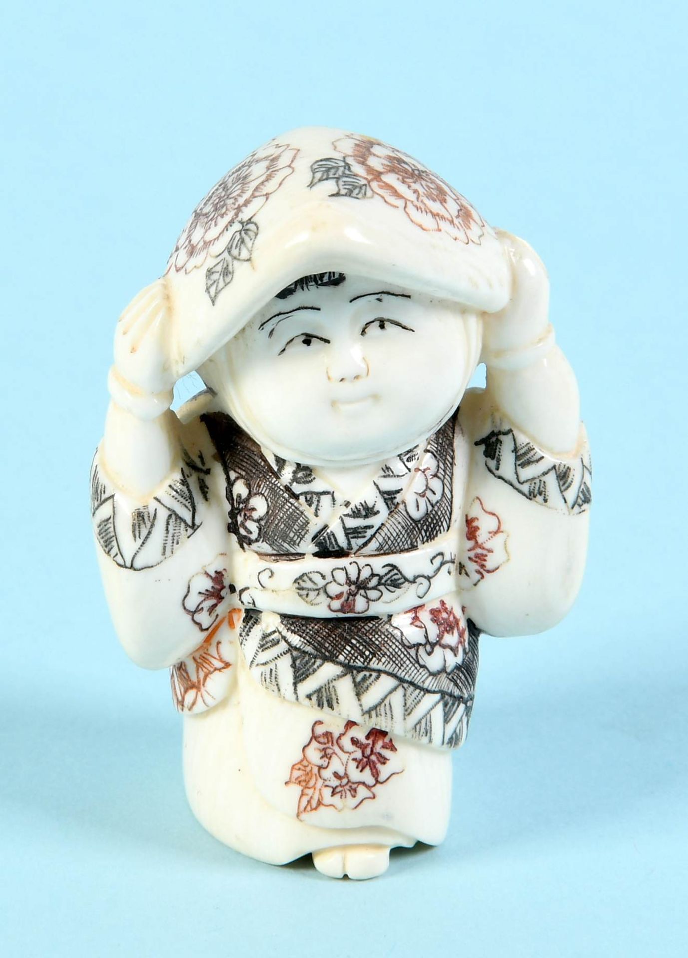 Netsuke - Mädchen mit Mütze