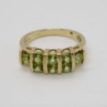 9ct gold dress ring with peridot fully HM size N 3.6g