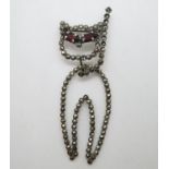 Vintage silver marquisate cat brooch with garnet eyes