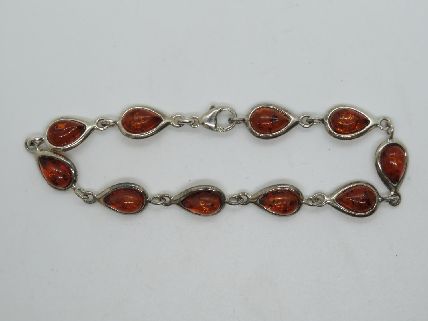 HM silver bracelet 7.75" set with baltic amber 8.8g