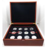 12x 1oz pure silver Coins of The World in Executive Collectors Wooden Box