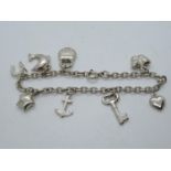 Novelty child's silver charm bracelet 6.75" 11.6g