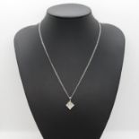 14ct white gold pendant on white gold chain set with 16 Princess cut diamonds approx .9ct 2.8g total