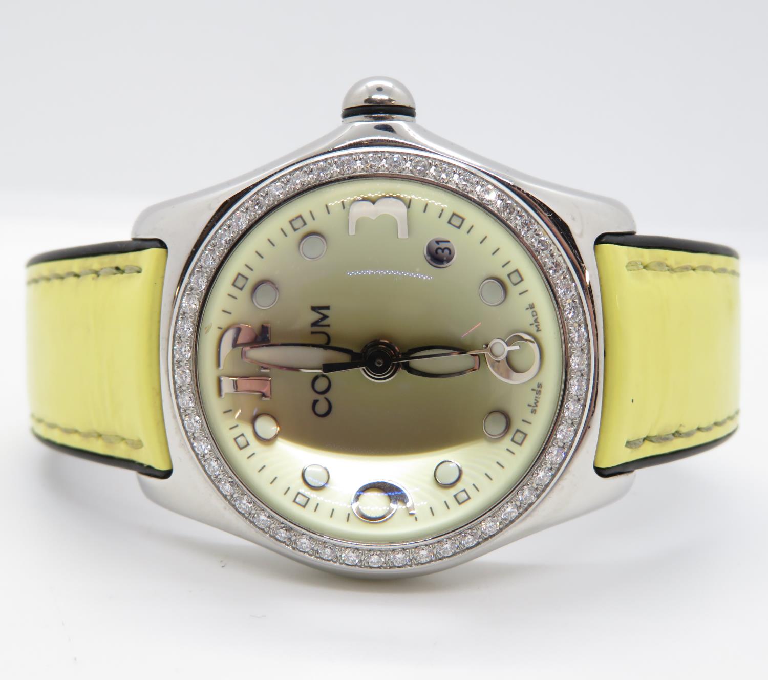 Corum Bubble watch diamond bezel and original box in near mint condition