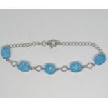 Ladies silver bracelet set with crazed blue topaz 7.5" 8.2g