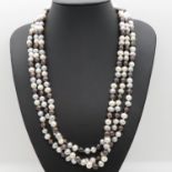 Opera length rope of white silver and peacock cultured pearls 72" 140g