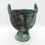 Very early bronze Chinese holder 7" high x 5" diameter early example