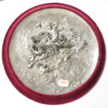 High relief Elkington and Co silver plated charger depicting cherubs on winged Apollo with vacant