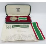 Womens Voluntary Service medal with paperwork