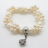 Freshwater pearl bracelet Thomas Sabo with attached silver charms signed Thomas Sabo