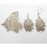 Silver filigree brooches and earrings