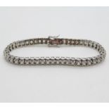 Silver tennis bracelet set with over 5cts of CZ stones HM 2006 Birmingham 7.5" 19.1g