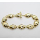 Heavy gold on silver bracelet with toggle fastener 7.5" 23g