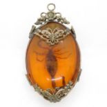 Amber pendant with scorpion inside 2.5" x 1.5"