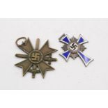 2X WW2 German medals. Silver mothers cross and merit cross with sword