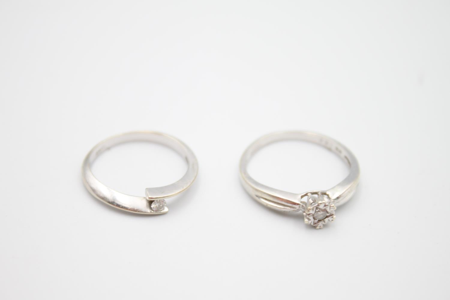 2 x 9ct white gold diamond rings inc bypass, solitaire 3.6g Size K on left & N on right