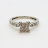 9ct white gold and diamond ring .15ct 1.7g size J