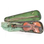 Very old violin in sarcophagus case with 2x bows