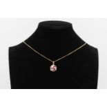 9ct Gold ruby & diamond swirl pendant necklace 4.2g