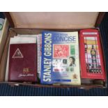 Suitcase containing stamp books, postcards, catalogues, booklets