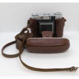 Zeiss Ikon Super Ikonta camera with box, strap and lens