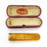 Leather cased cheroot with amber and 9ct gold
