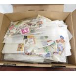 2x boxes containing large quantity of World and Commonwealth stamps over 20,000
