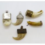 Selection of claws and teeth in silver or gold clasps