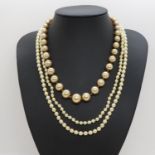 Selection of unchecked pearl necklaces