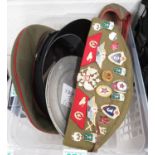 2x Russian military hats with lots of badges, 2x tin WWI French plates and set of Moroccan shoes